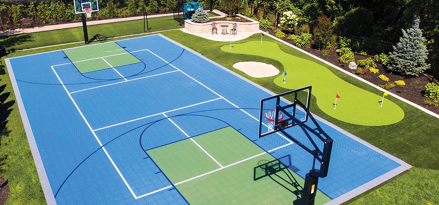 Backyard sport court and custom putting green